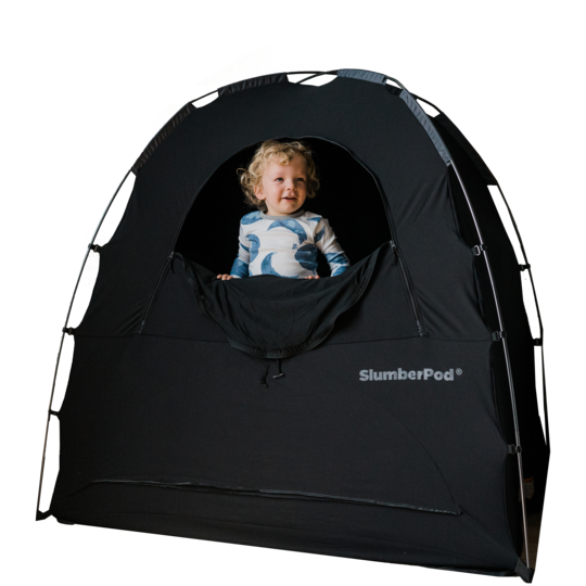 The Slumberpod shown with a child standing inside and peaking out the flap.